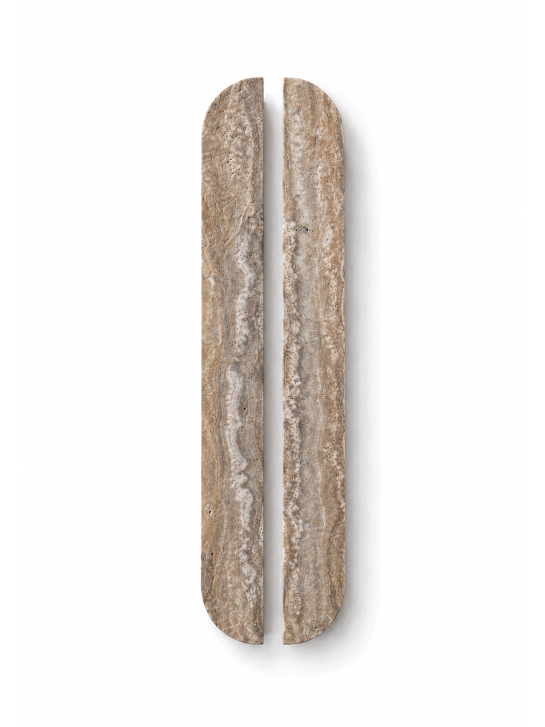Two elongated, rounded rectangular stone slabs with a natural travertine or marble texture in beige, brown, and gray tones, displayed vertically side-by-side on a white background.