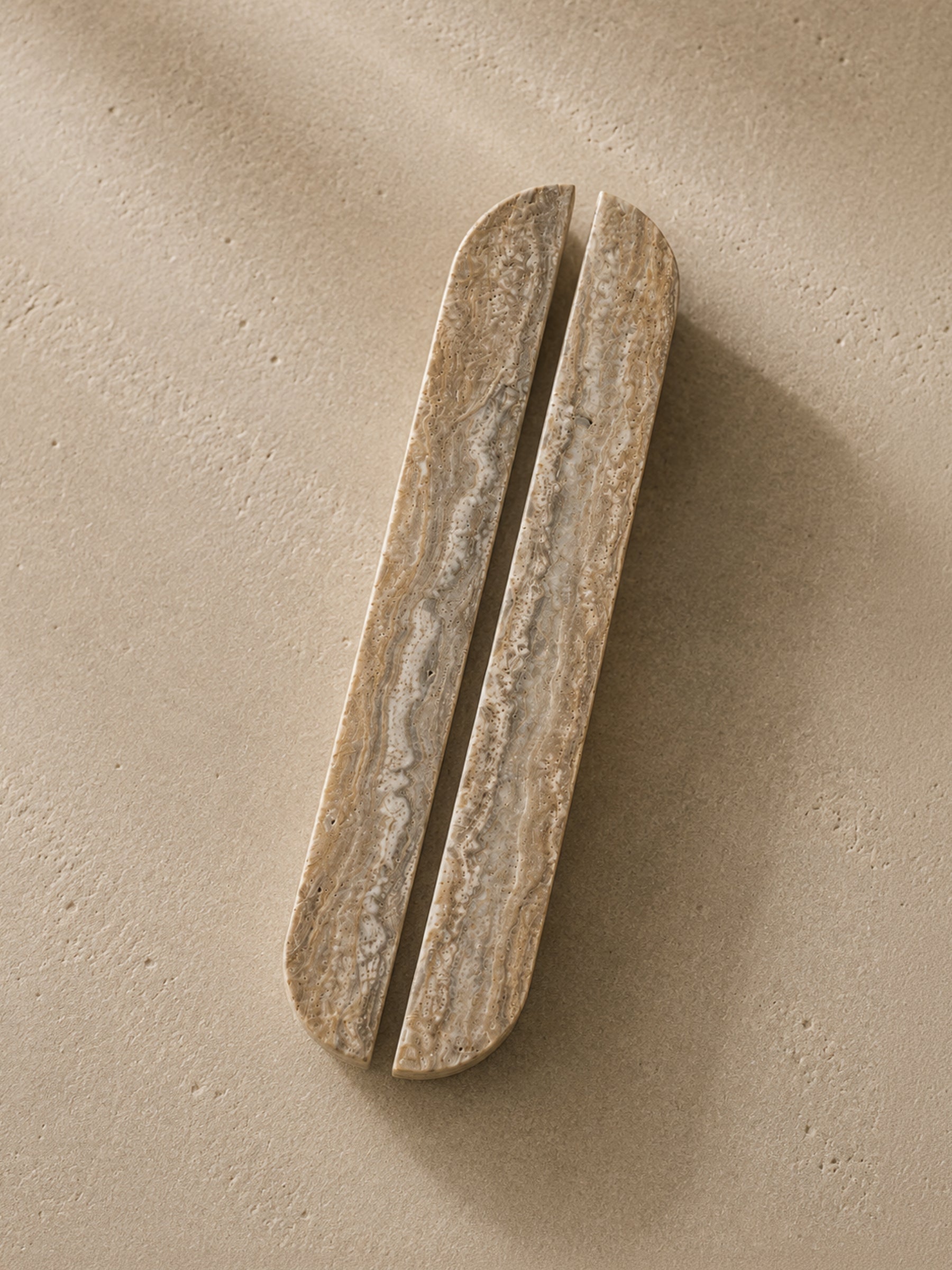 Silver Travertine natural stone cabinet handles by Formed Home, handcrafted luxury stone pull handles with rounded design.
